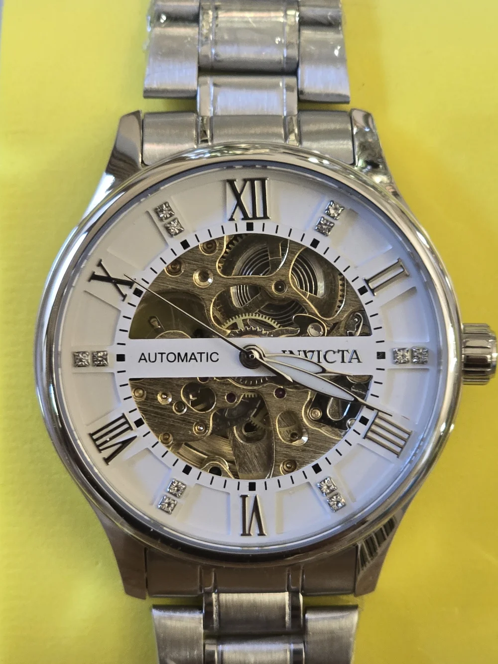 Invicta Men's Silver Skeleton Dial Automatic Watch with White Accents
